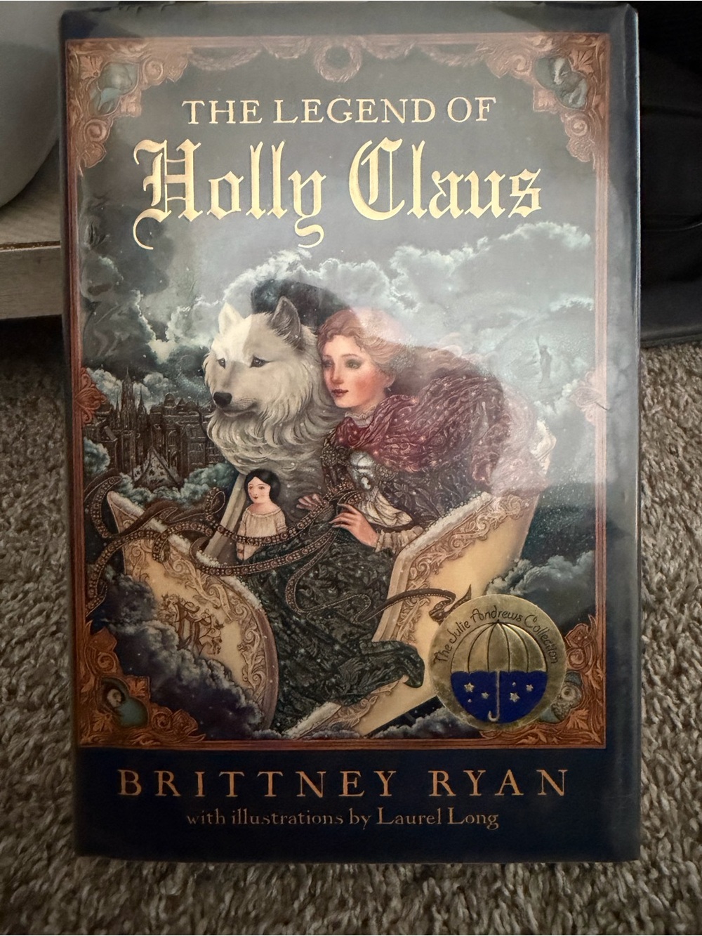 The Legend of Holly Claus by - Illustrated Hardcover (Blue)